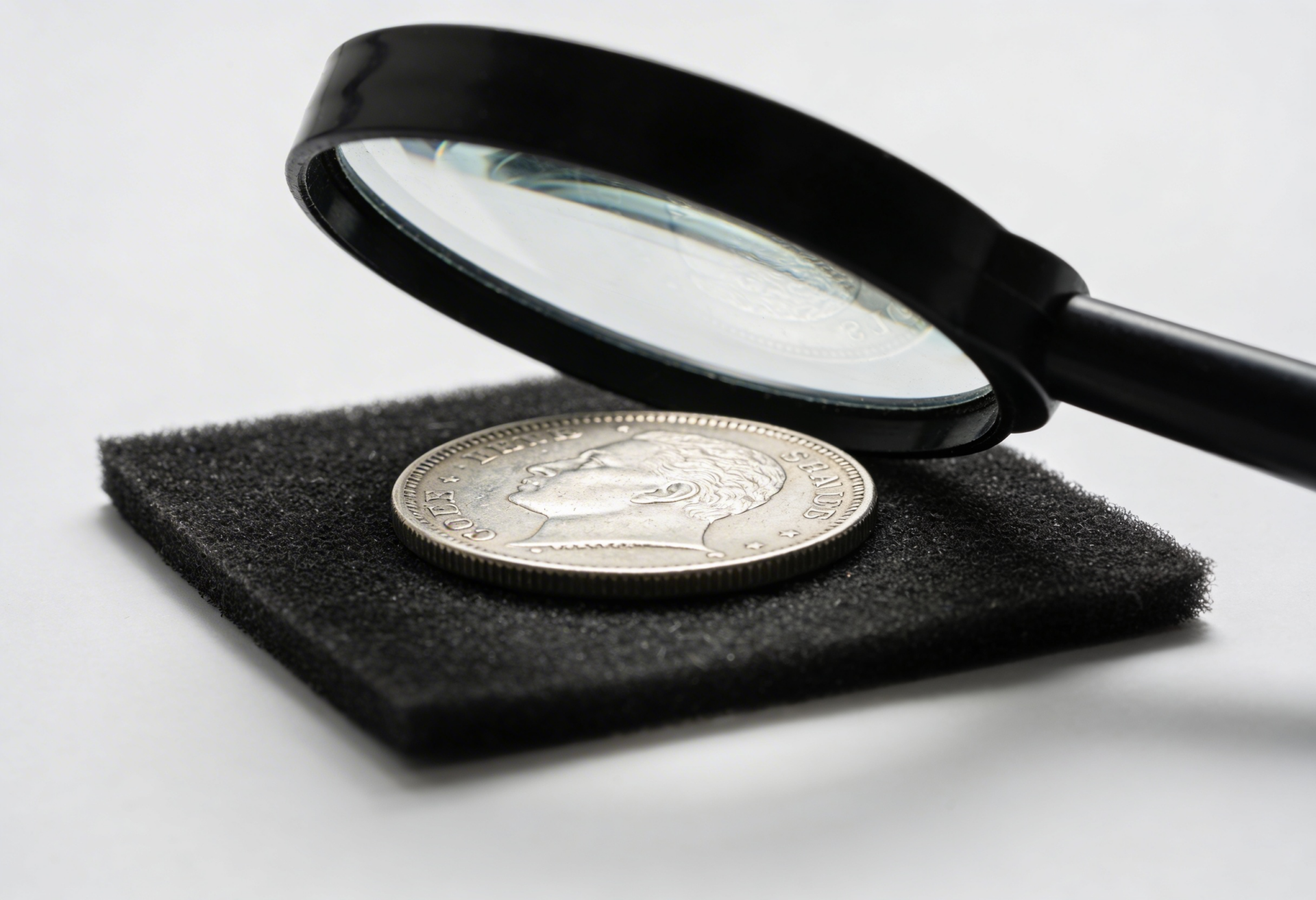 Startseite 2 Wie kann ich die Echtheit einer Münze prüfen?